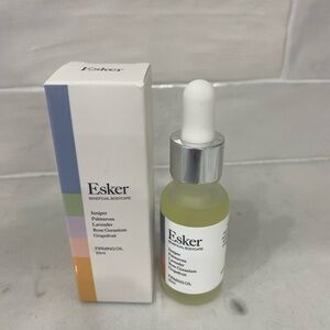 New esker firming body oil